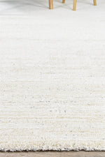 Nirvana Cream Heathered Linear Microfibre Plush Rug