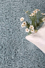 Danso Shaggy Turquoise Blue Round Rug - The Rugs